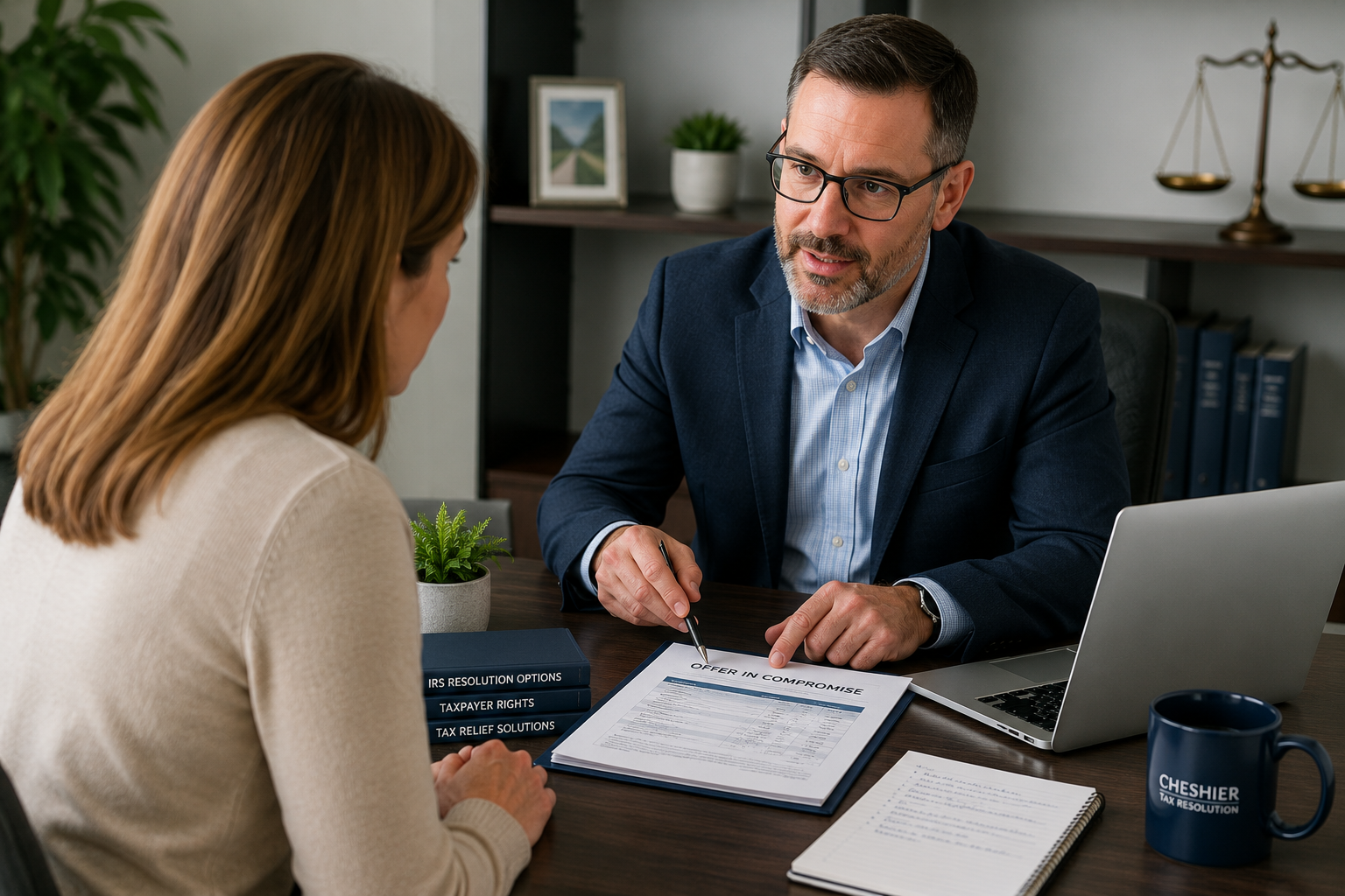Tax professional reviewing Offer in Compromise eligibility with taxpayer during IRS debt consultation